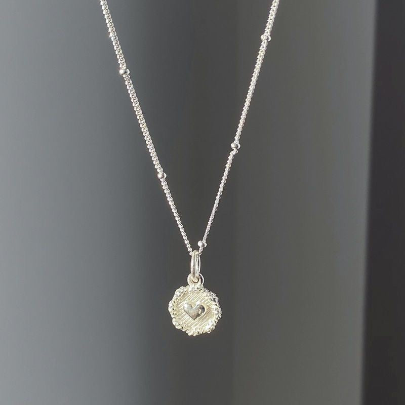 Small round heart pendant necklace