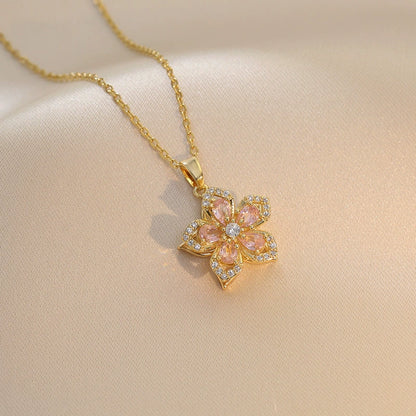 Women's floral fidget spinner necklace with rotating crystal flower pendant
