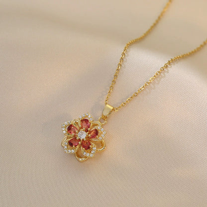 Women's floral fidget spinner necklace with rotating crystal flower pendant