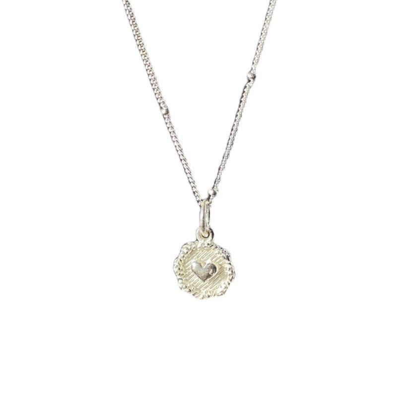Small round heart pendant necklace