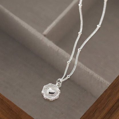 Small round heart pendant necklace