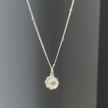 Small round heart pendant necklace