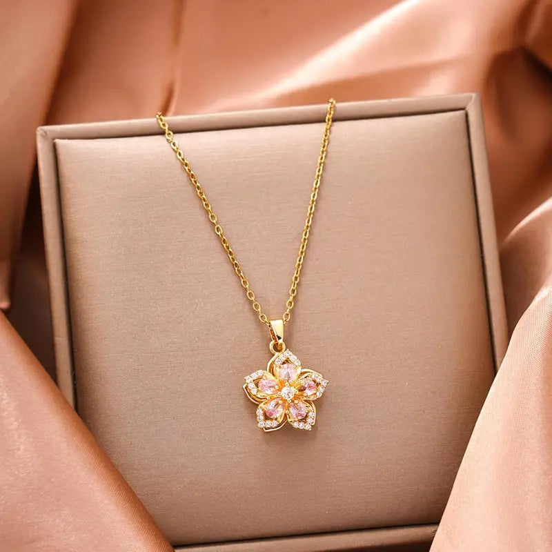 Women's floral fidget spinner necklace with rotating crystal flower pendant